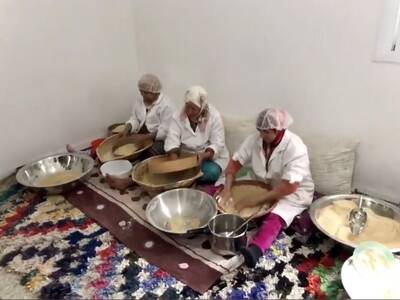 Women using the newly-developed ingredients to make traditional dishes
